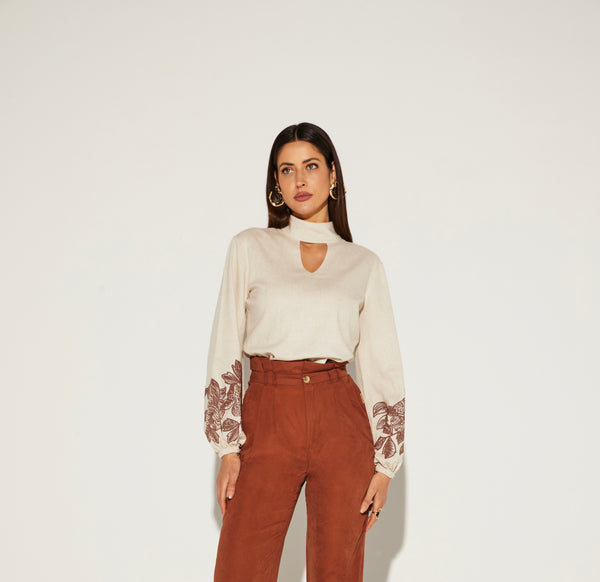 BLUSA FEMININA GOLA ALTA MANGA PUFF ONÇA PRETA