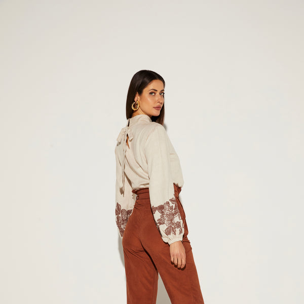 BLUSA FEMININA GOLA ALTA MANGA PUFF ONÇA PRETA